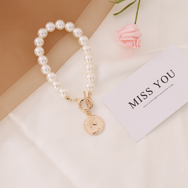 Halskjede med matchende armbånd