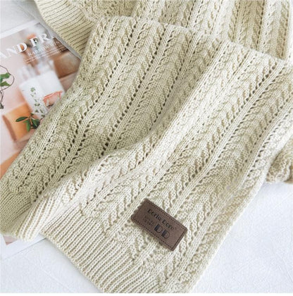 Flettestrikket ull skjerf