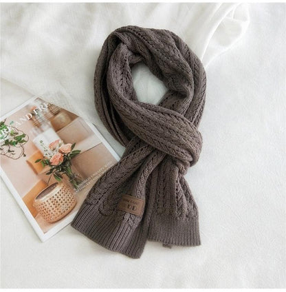 Flettestrikket ull skjerf