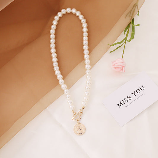 Halskjede med matchende armbånd