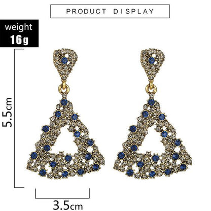 VAKKERT ØREPYNT MED BLÅ STONES