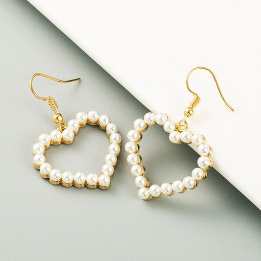 HJERTEFORMET ØREPYNT MED PERLER