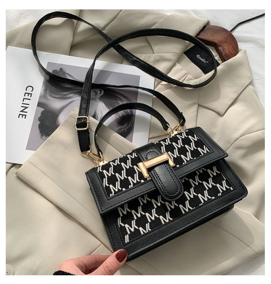 Skulderveske i retro stil