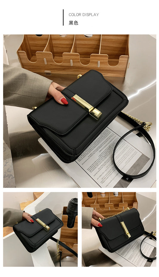 VESKE SVART MED GULLFARGET DETALJER